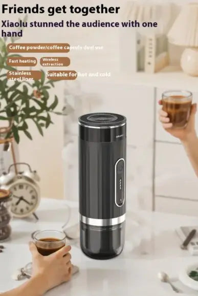 Black coffee maker on a white surface with hands holding cups of coffee, and text about the product.