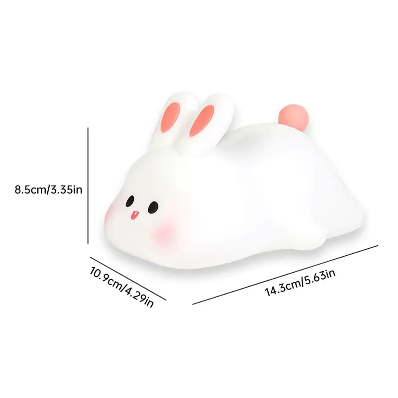 White rabbit-shaped squishy toy with measurements on a white background
