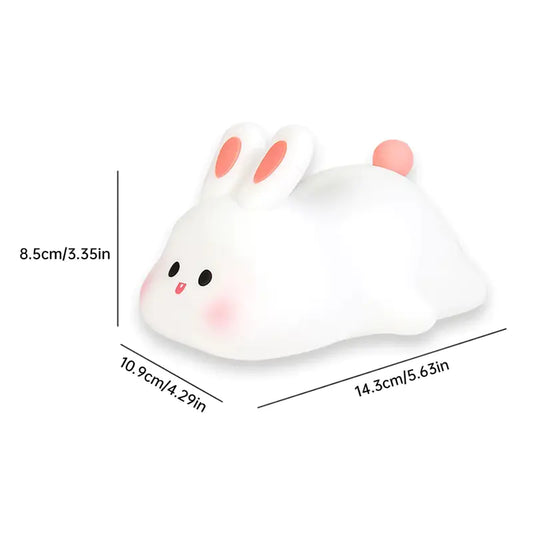 White rabbit-shaped squishy toy with measurements on a white background